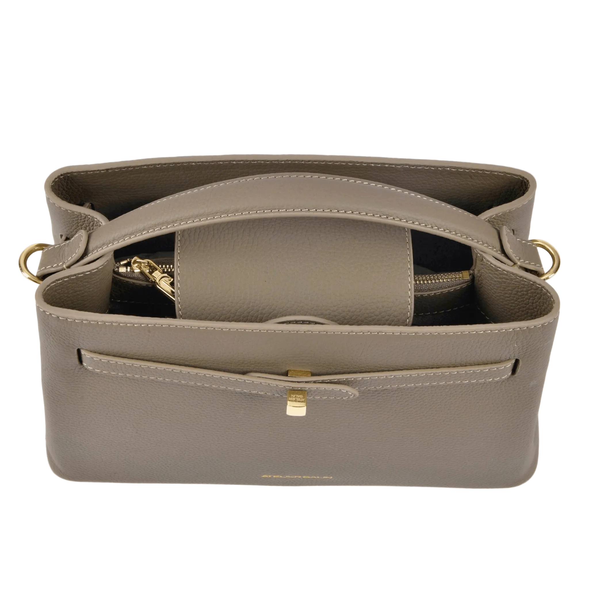 Open beige atelier galin cube lock handbag with gold logo hardware on a white background