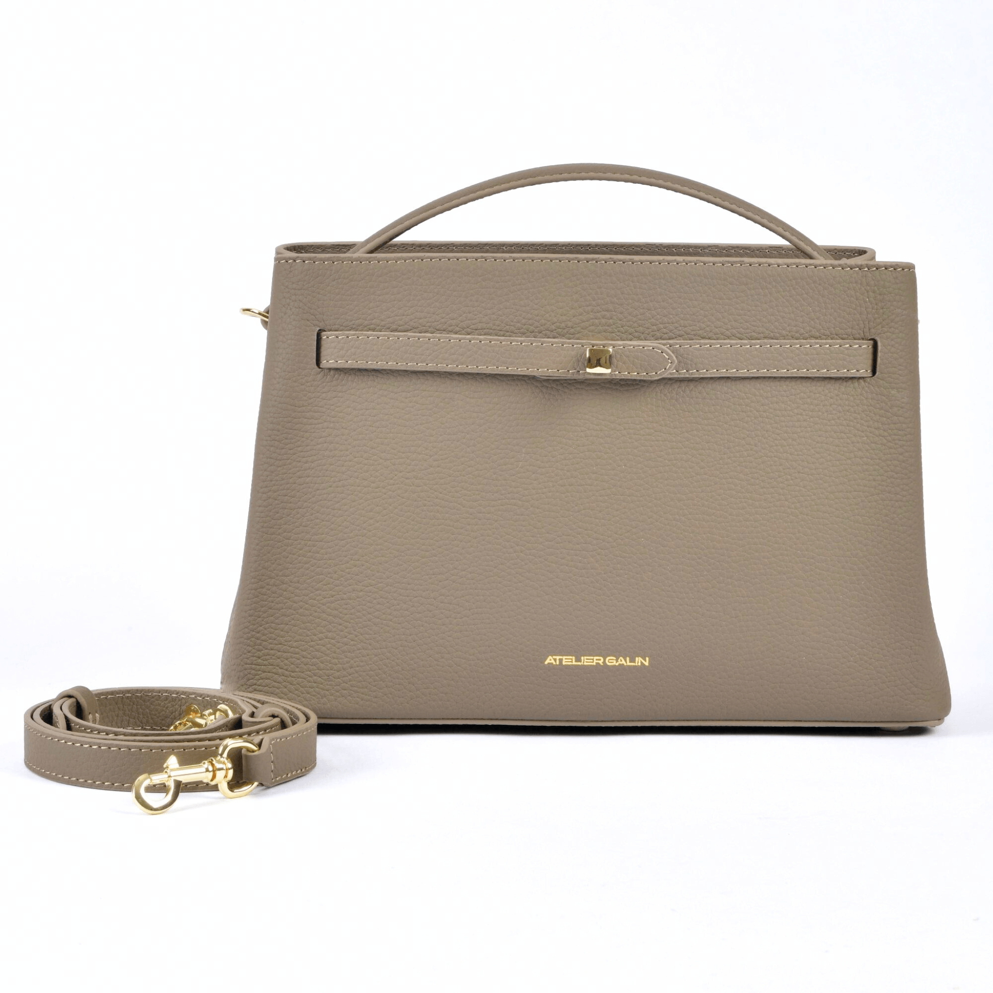 beige-mink-leather-mid-range-bag-brands atelier-galin-cube-lock handbag with a matching strap on a white background