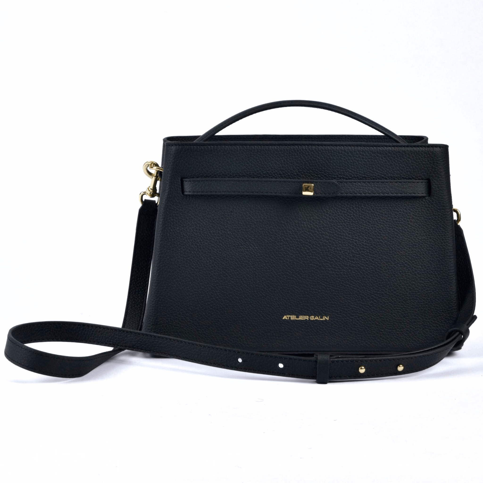atelier galin cube lock handbag in black lwg gold certified grained leather and gold hardware  shoulder strap 