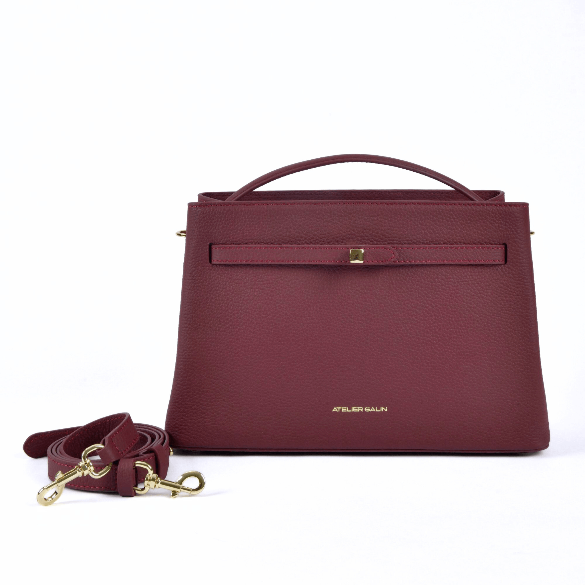 burgundy red leather atelier galin handbag with gold cube lock with detachable strap
