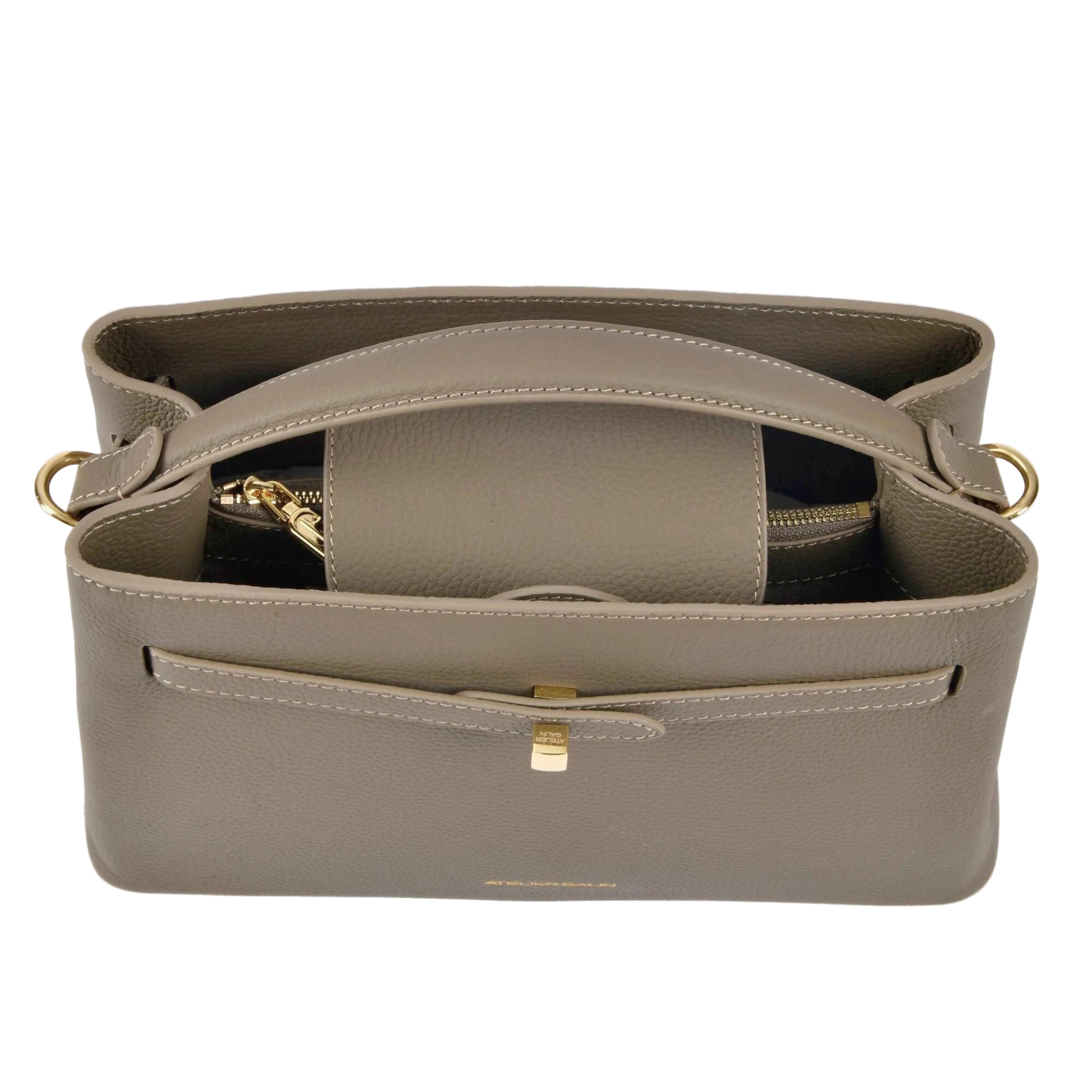 Gray handbag with gold accents on a white background