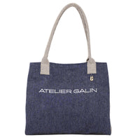 Blue tote bag with 'Atelier Galin' branding on a white background